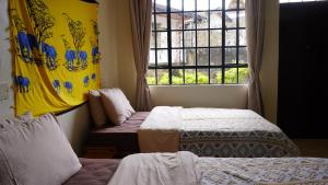 Postel nebo postele na pokoji v ubytování ZZZ hostel Nairobi