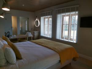 Postel nebo postele na pokoji v ubytování B&B Entre Champs