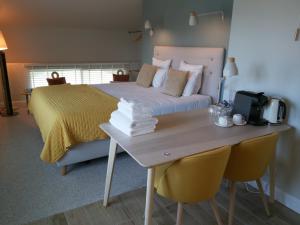 Postel nebo postele na pokoji v ubytování B&B Entre Champs