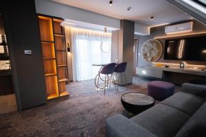 Kuchyň nebo kuchyňský kout v ubytování Riva Prestige Hotel