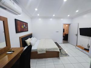 Φωτογραφία από το άλμπουμ του AB Luxury 2 bedroom Apartment with 24hr Electricity, Wifi, Fully Equipped Kitchen σε Lagos