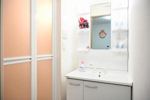 Koupelna v ubytování 大阪梅田淀川花民宿101套房 + 32 fotografií