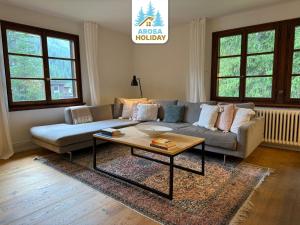 Posezení v ubytování Chalet Pradella by Arosa Holiday