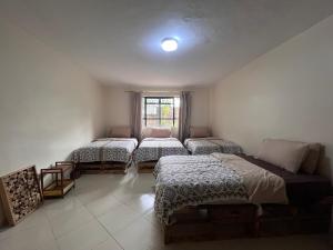 Postel nebo postele na pokoji v ubytování ZZZ hostel Nairobi