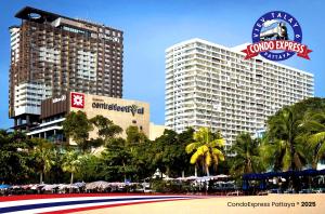 a view of a resort with buildings and a beach at Condo Express View Talay 6 in Pattaya Central