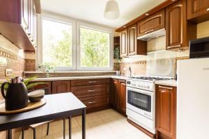 Nhà bếp/bếp nhỏ tại CityStay Młodych Techników