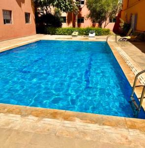 Πισίνα στο ή κοντά στο Appartement Luxueux à Guéliz