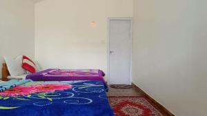 En eller flere senge i et værelse på Vi stays