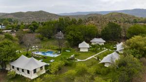 an aerial view of a resort with tents and a pool at The Kablan Luxury Living Ranthambore in Sawāi Mādhopur
