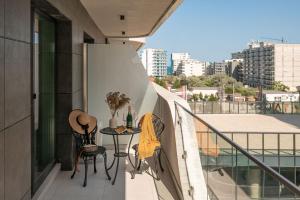 Μπαλκόνι ή βεράντα στο Nord Luxury Apartment in Odyssey Spa&Pool-parking