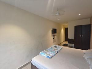Postel nebo postele na pokoji v ubytování Hotel AB Top
