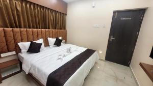 Ένα ή περισσότερα κρεβάτια σε δωμάτιο στο Hotel RA Apartment