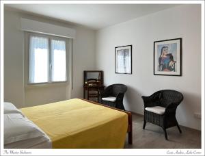 Postel nebo postele na pokoji v ubytování Casa Azalea, vista lago e giardino + 25 fotografií