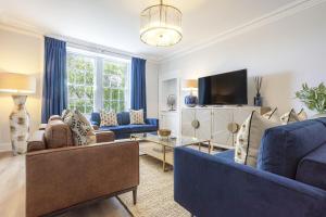 Televisyen dan/atau pusat hiburan di Skye Sands - Westview House
