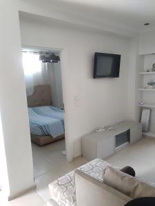 Postel nebo postele na pokoji v ubytování Appartement au Bord de la Mer