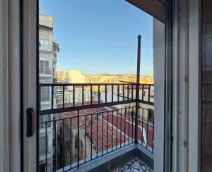 a view from a window of a balcony at TWO ENTIRE APARTMENTS LIV Luxury Central C-D in Thessaloniki