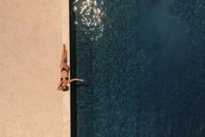 Fotografie z fotogalerie ubytování Black Rose Beach Suites v destinaci Perivolos