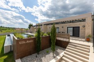 a building with a sign that reads villa archer at Villa Andrea in Vižinada