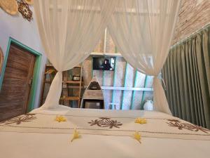 A bed or beds in a room at Secret Triangle