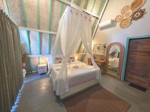 A bed or beds in a room at Secret Triangle