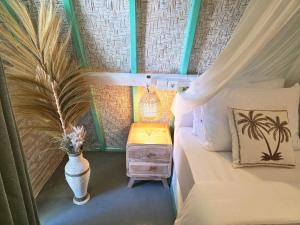 A bed or beds in a room at Secret Triangle