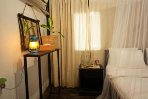 Postel nebo postele na pokoji v ubytování Camp Leopard - Yala Safari Glamping