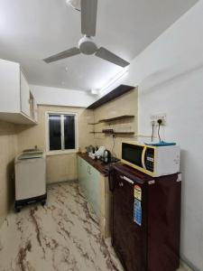 Kuchyň nebo kuchyňský kout v ubytování Enzo Studio Apartment at Pali Hill