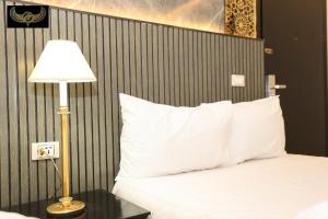Katil atau katil-katil dalam bilik di Giza Inn view
