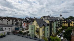a view of a city with colorful buildings at VacationClub - Baltic Waves Resort Apartament A325 in Międzywodzie