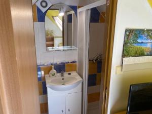 Koupelna v ubytování Apartmány Jedovnice