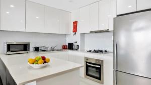 Η κουζίνα ή μικρή κουζίνα στο Luxe Pelican Lake +10 φωτογραφίες