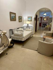 Posteľ alebo postele v izbe v ubytovaní Fortezza Garden Home