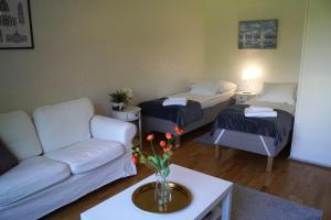 Ένα ή περισσότερα κρεβάτια σε δωμάτιο στο Apartments Borg Annikki