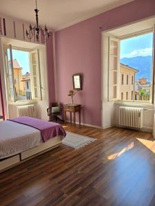 Voodi või voodid majutusasutuse Borghese Rooms - Città Vecchia Locarno toas