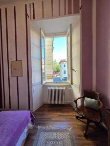 Voodi või voodid majutusasutuse Borghese Rooms - Città Vecchia Locarno toas