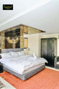 Katil atau katil-katil dalam bilik di Giza Inn view