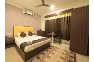 Ένα ή περισσότερα κρεβάτια σε δωμάτιο στο Hotel Mild Inn +8 φωτογραφίες