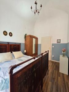 Voodi või voodid majutusasutuse Borghese Rooms - Città Vecchia Locarno toas
