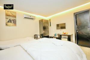 Katil atau katil-katil dalam bilik di Giza Inn view