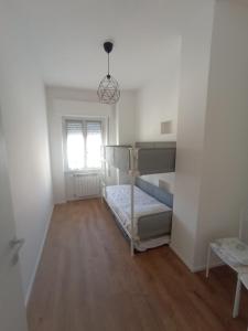 Postel nebo postele na pokoji v ubytování Da Simo - Beach House + 5 fotografií