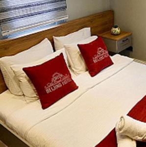 Postel nebo postele na pokoji v ubytování The Şişli PP Beijng Suites and Noodle House