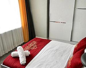 Postel nebo postele na pokoji v ubytování The Şişli PP Beijng Suites and Noodle House