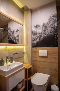 Koupelna v ubytování Luksusowy Apartament Czorsztyn 2 z sauną i ogrodem + 11 fotografií