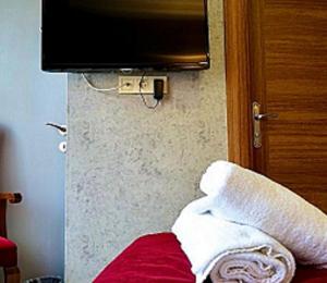 TV a/nebo společenská místnost v ubytování The Şişli PP Beijng Suites and Noodle House