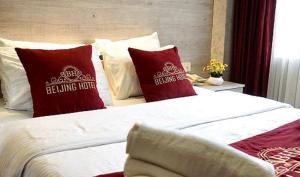 Postel nebo postele na pokoji v ubytování The Şişli PP Beijng Suites and Noodle House