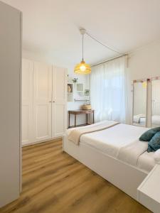 Postel nebo postele na pokoji v ubytování The cozy apartment - Turro M1