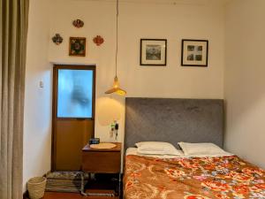 Postel nebo postele na pokoji v ubytování Nomads Hideaway A Garden Villa Homestay in Matara