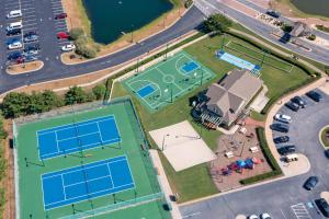 an overhead view of two tennis courts on a street at CC230- A Shore Thing in Corolla