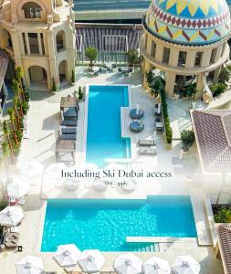 an overhead view of a swimming pool at a hotel at Kempinski Hotel Mall of the Emirates, Dubai in Dubai