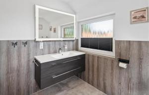 a bathroom with a sink and a window at 3 Bedroom Nice Home In Osteel in Osteel +2 photos